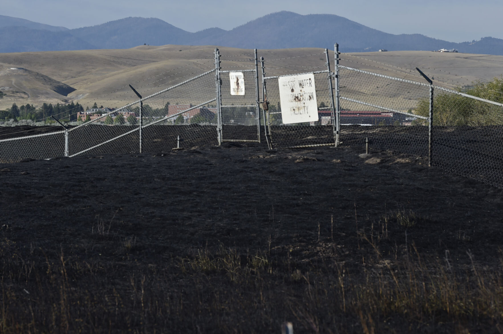 Burnt ground blankets the area